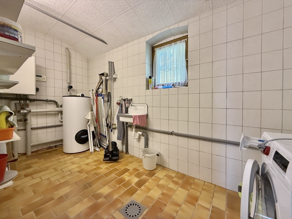 Hauswirtschaftsraum mit Heizungsanlage