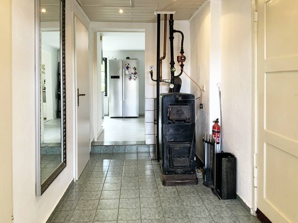 Diele mit zentraler Ofenheizung Diele mit zentraler Ofenheizung