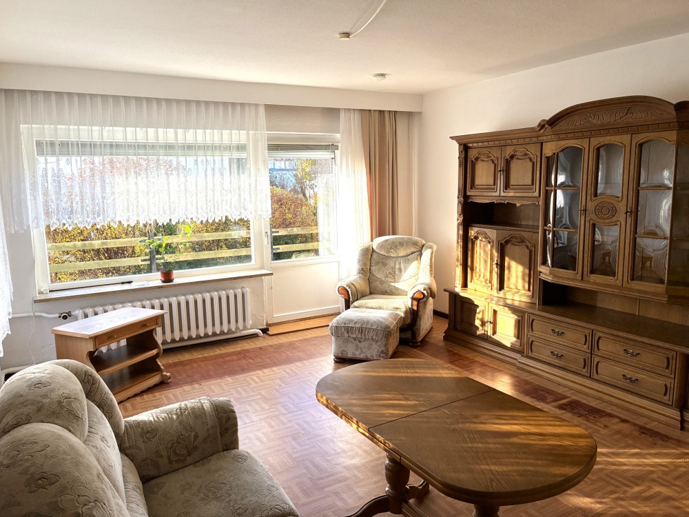 Wohnzimmer mit Zugang zur Terrasse