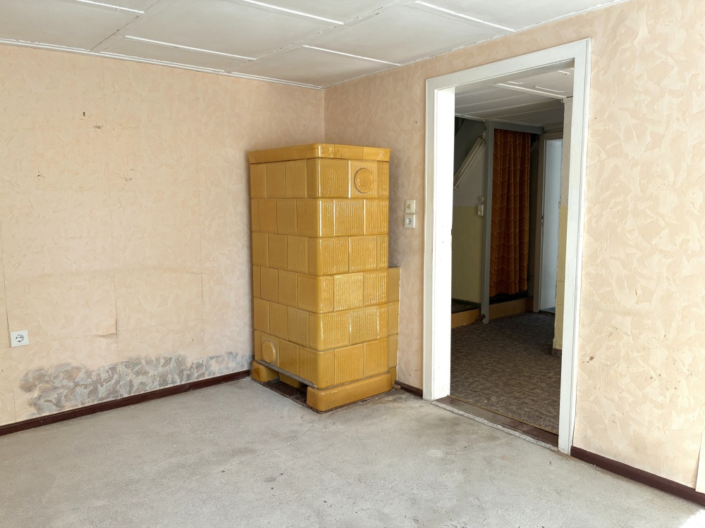 Zimmer mit Kachelofen