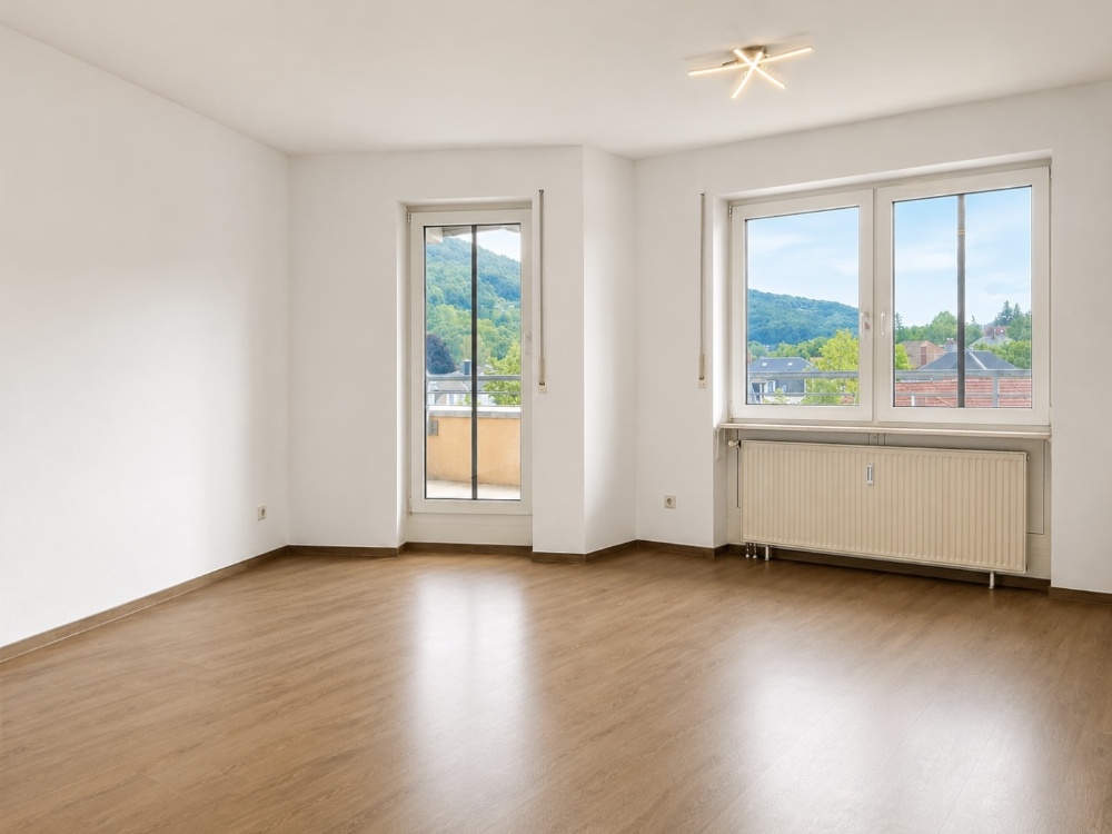 Wohnzimmer mit Zugang zur Dachterrasse