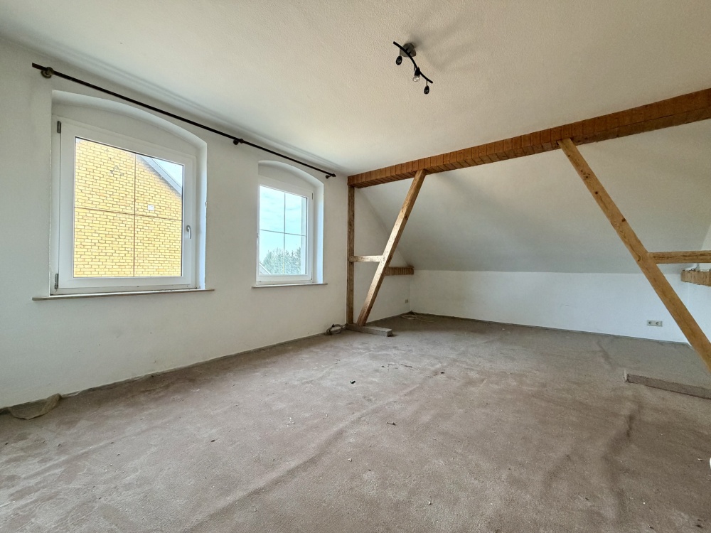 Charmantes Schlafzimmer im Dachgeschoss