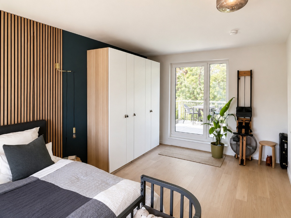Schlafzimmer mit Zugang zur Dachterrase