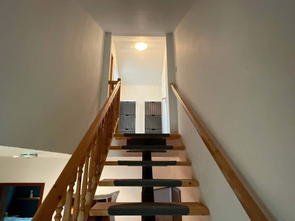 Treppe ins Obergeschoss