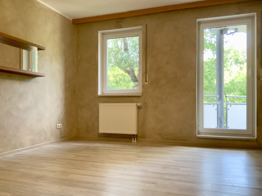 Schlafzimmer mit Balkonzugang