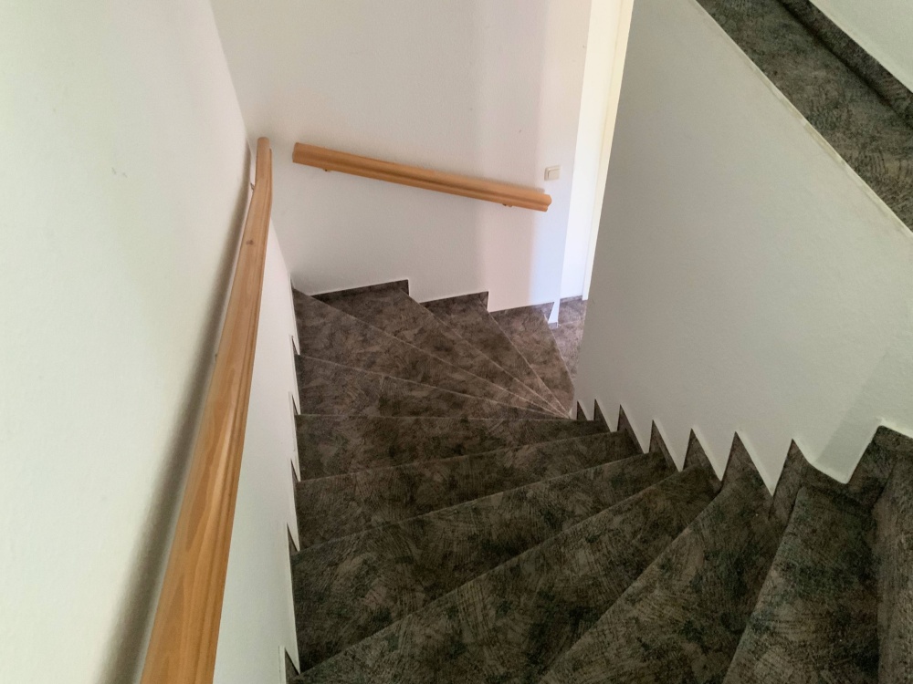 Treppe ins Obergeschoss